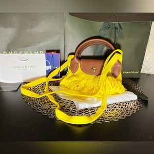 SOLD Authentic Longchamp Filet Bag